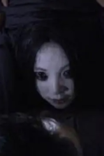 a ghost beside the pillow